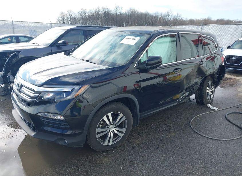 Photo 2 of 2018 Honda Pilot EX-L (VIN 5FNYF6H52JB067299)