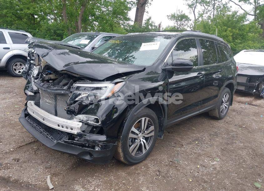 Photo 2 of 2018 Honda Pilot EX-L (VIN 5FNYF6H53JB009282)