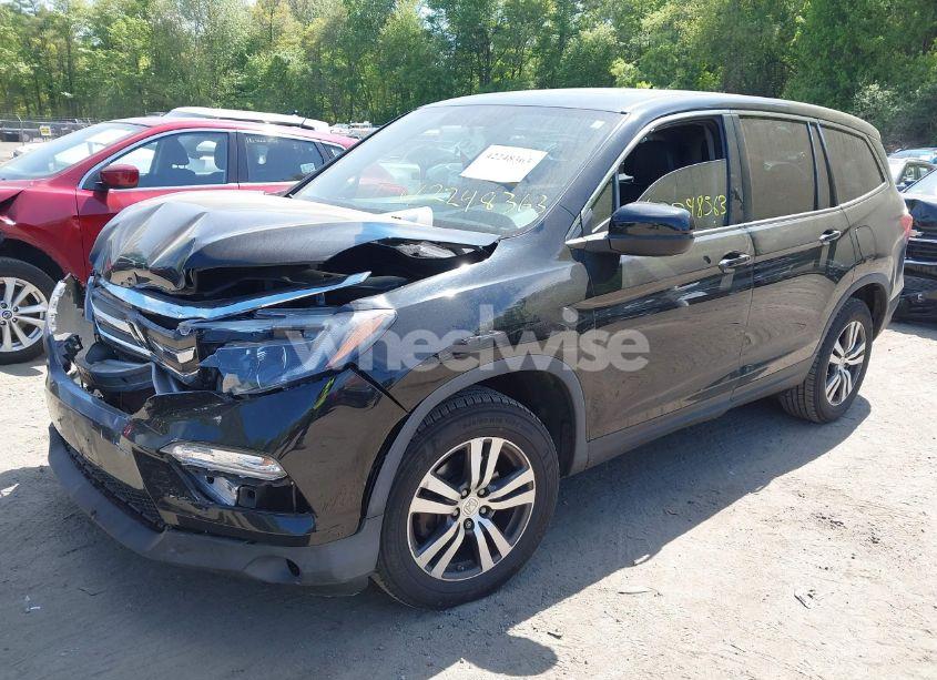 Photo 2 of 2017 Honda Pilot EX-L (VIN 5FNYF6H54HB010936)