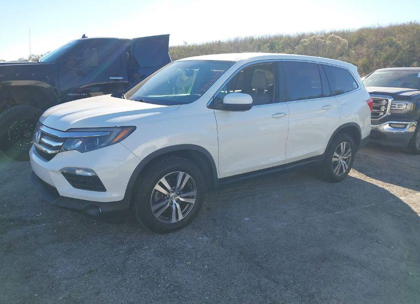 Photo 2 of 2018 Honda Pilot EX-L (VIN 5FNYF6H54JB055168)