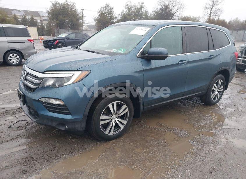 Photo 2 of 2016 Honda Pilot EX-L (VIN 5FNYF6H55GB105942)