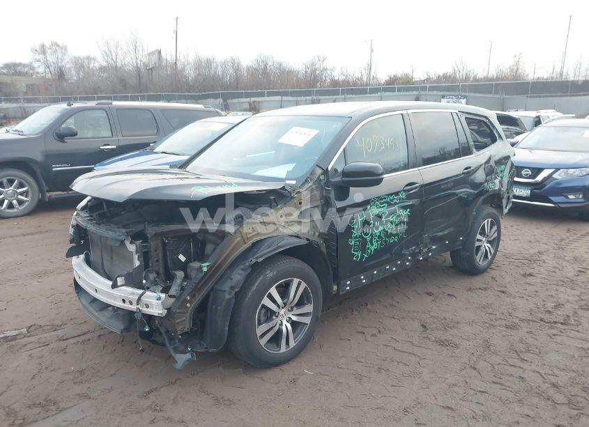 Photo 2 of 2018 Honda Pilot EX-L (VIN 5FNYF6H55JB027556)