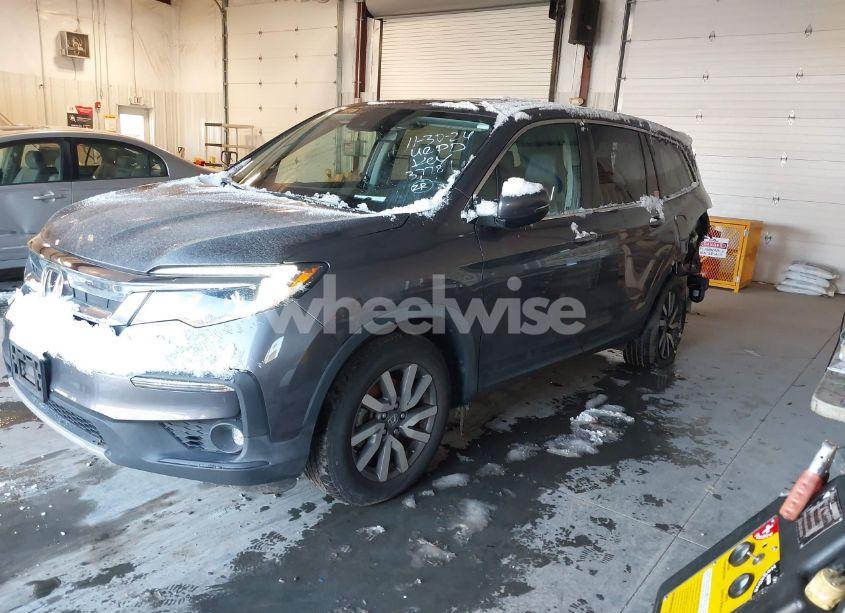 Photo 2 of 2021 Honda Pilot AWD EX-L (VIN 5FNYF6H56MB037761)