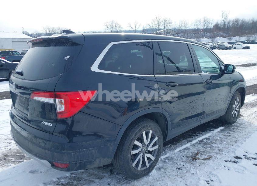 Photo 4 of 2021 Honda Pilot AWD EX-L (VIN 5FNYF6H57MB069800)