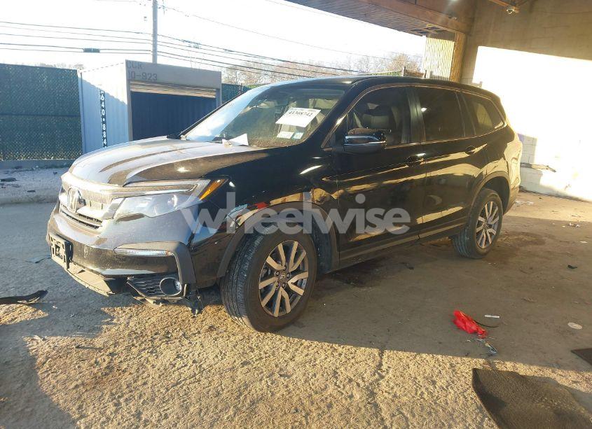 Photo 2 of 2022 Honda Pilot AWD EX-L (VIN 5FNYF6H57NB035910)