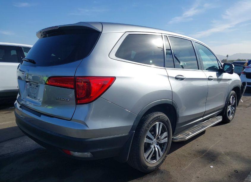 Photo 4 of 2017 Honda Pilot EX-L (VIN 5FNYF6H59HB001228)