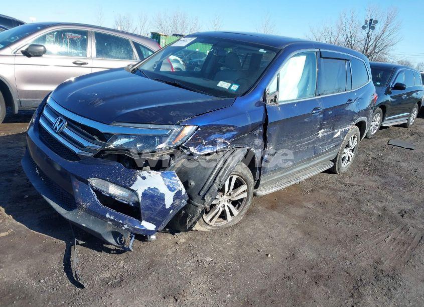 Photo 2 of 2017 Honda Pilot EX-L (VIN 5FNYF6H59HB023052)