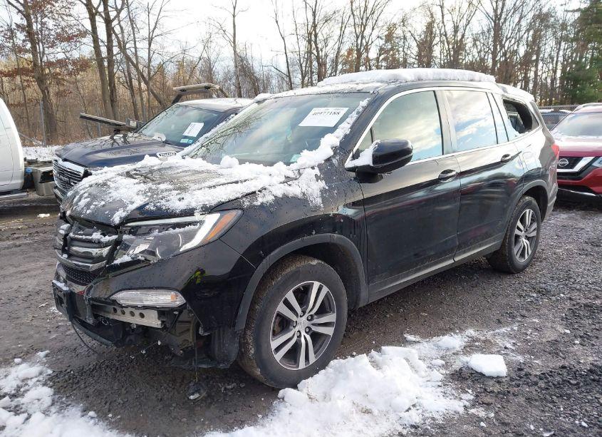 Photo 2 of 2017 Honda Pilot EX-L (VIN 5FNYF6H59HB091786)