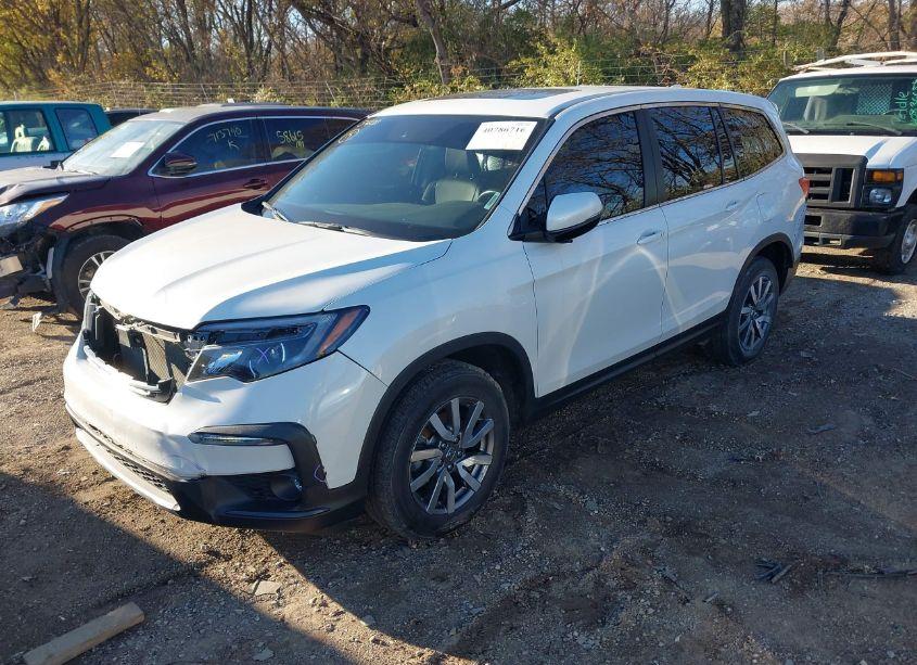 Photo 2 of 2021 Honda Pilot AWD EX-L (VIN 5FNYF6H59MB016662)