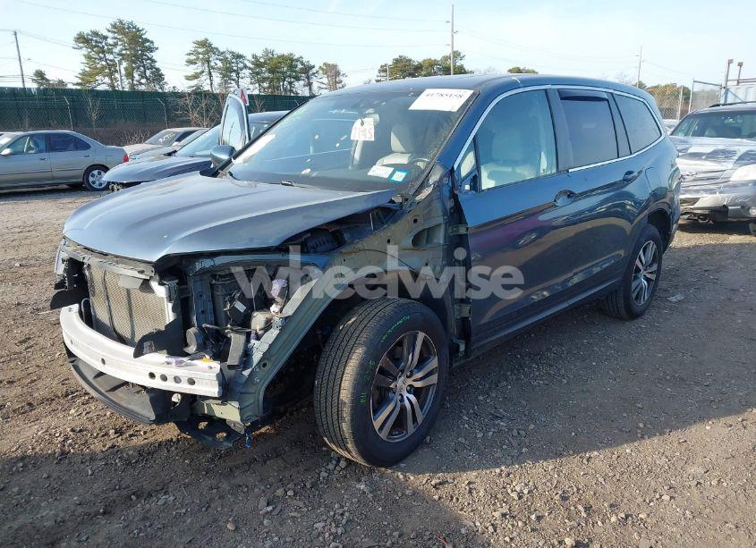 Photo 2 of 2017 Honda Pilot EX-L (VIN 5FNYF6H5XHB060272)