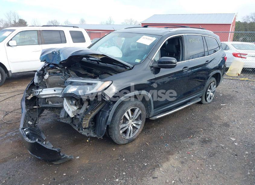 Photo 2 of 2018 Honda Pilot EX-L (VIN 5FNYF6H5XJB012888)