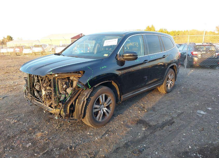 Photo 2 of 2017 Honda Pilot EX-L (VIN 5FNYF6H60HB026835)