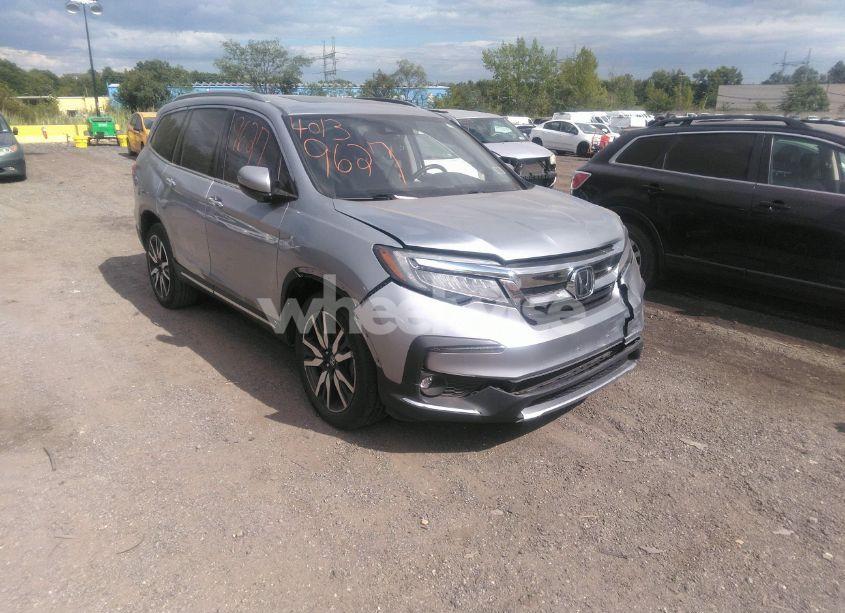 2022 Honda Pilot AWD TOURING 7 PASSENGER (VIN 5FNYF6H60NB013465) main photo