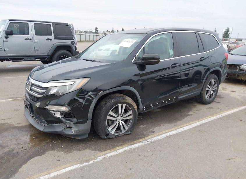 Photo 2 of 2017 Honda Pilot EX-L (VIN 5FNYF6H64HB006006)