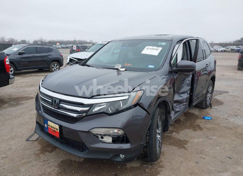 Photo 2 of 2017 Honda Pilot EX-L (VIN 5FNYF6H65HB100427)