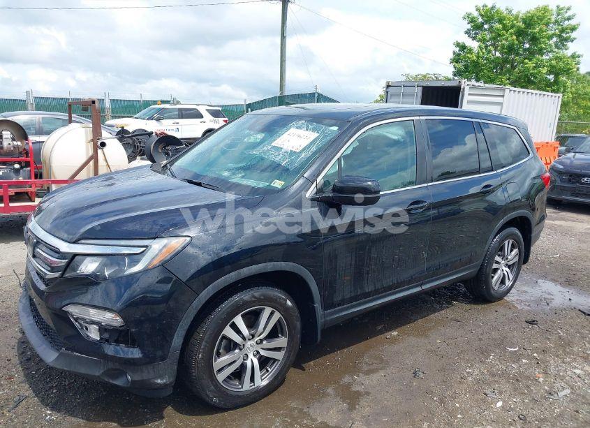 Photo 2 of 2017 Honda Pilot EX-L (VIN 5FNYF6H67HB049027)