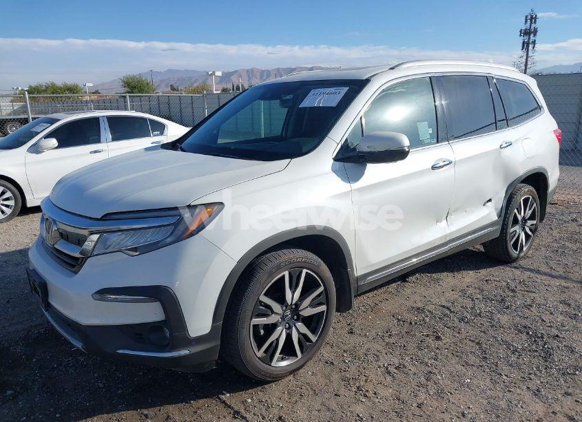 Photo 2 of 2022 Honda Pilot AWD TOURING 7 PASSENGER (VIN 5FNYF6H67NB017660)
