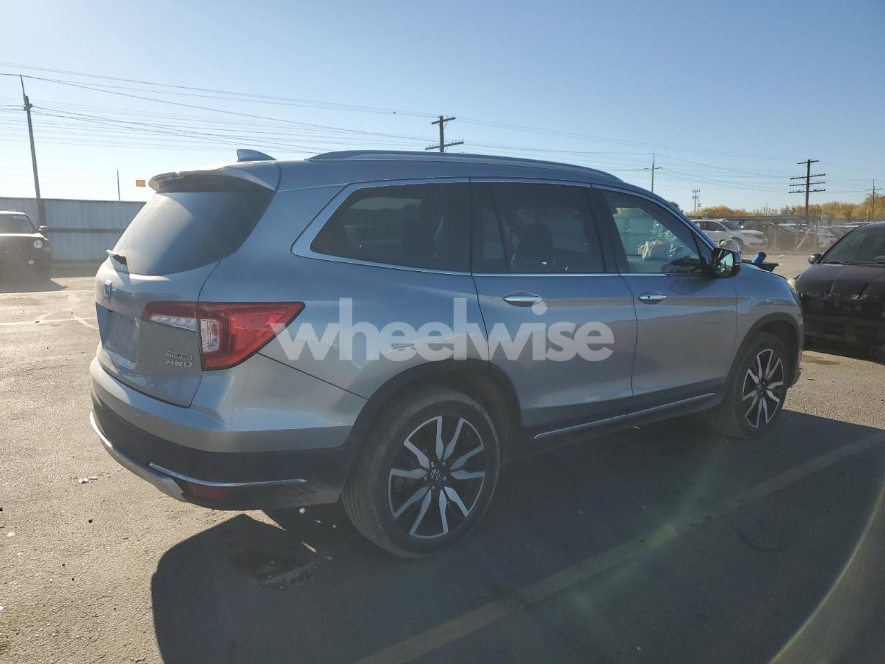 Photo 3 of 2022 HONDA PILOT TOURING (VIN 5FNYF6H6XNB078968)