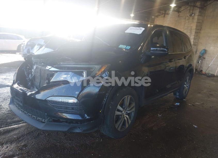 Photo 2 of 2018 Honda Pilot EX-L (VIN 5FNYF6H71JB041343)