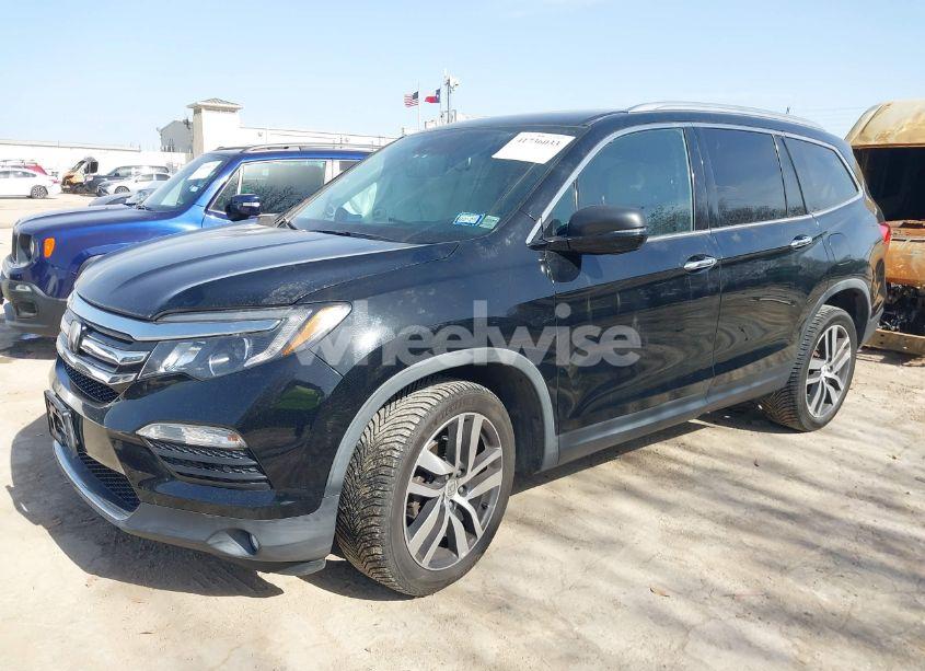 Photo 2 of 2016 Honda Pilot TOURING (VIN 5FNYF6H90GB107620)