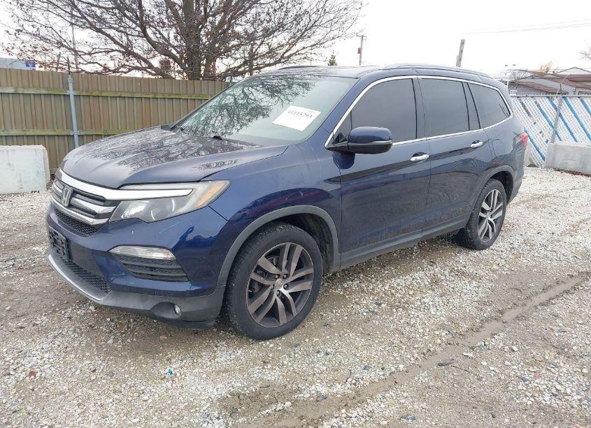 Photo 2 of 2017 Honda Pilot TOURING (VIN 5FNYF6H90HB015571)