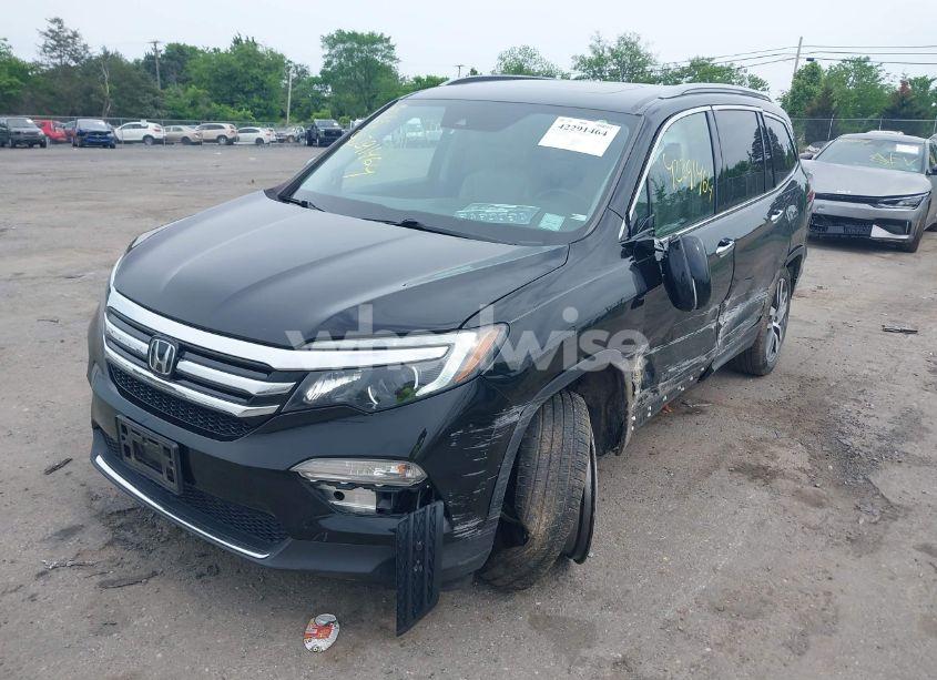 Photo 2 of 2017 Honda Pilot TOURING (VIN 5FNYF6H90HB052474)