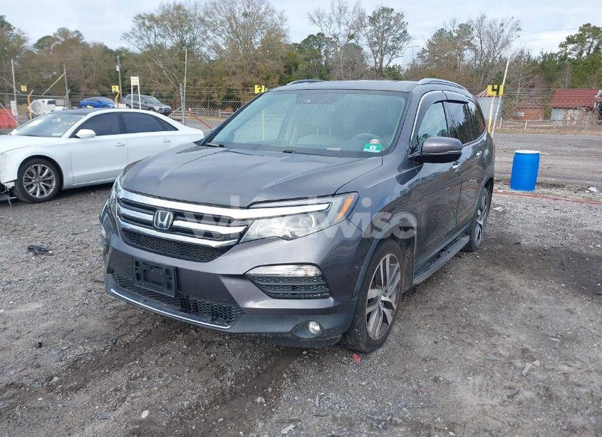 Photo 2 of 2017 Honda Pilot TOURING (VIN 5FNYF6H90HB100202)