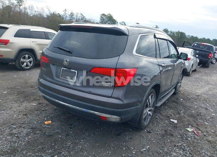 Photo 4 of 2017 Honda Pilot TOURING (VIN 5FNYF6H90HB100202)