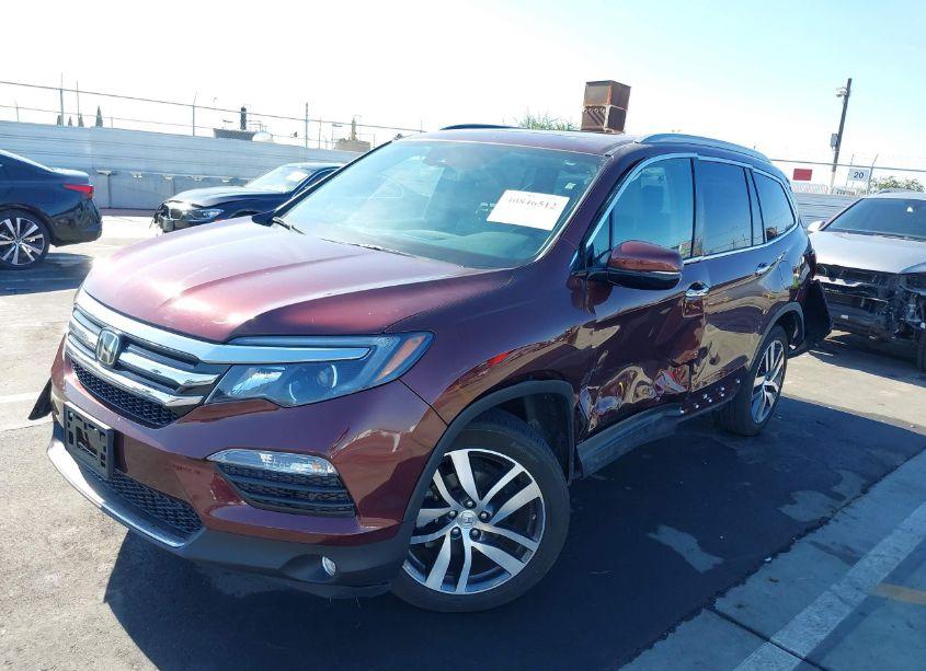 Photo 2 of 2018 Honda Pilot TOURING (VIN 5FNYF6H90JB052674)