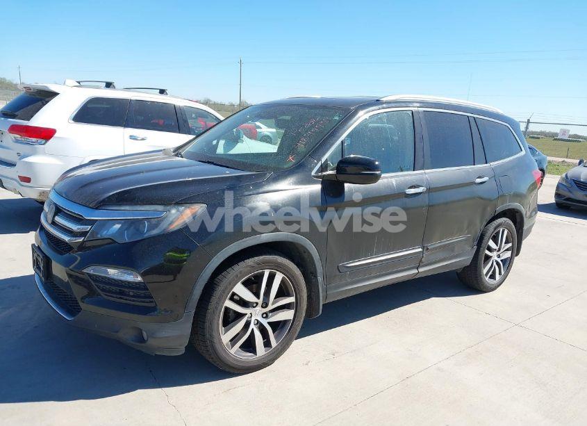 Photo 2 of 2016 Honda Pilot TOURING (VIN 5FNYF6H92GB083370)