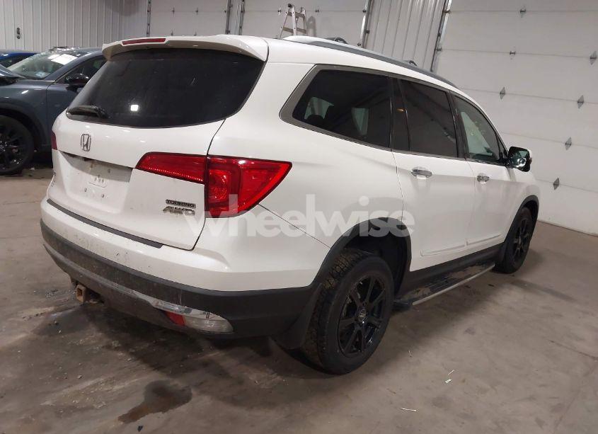 Photo 4 of 2016 Honda Pilot TOURING (VIN 5FNYF6H93GB078601)