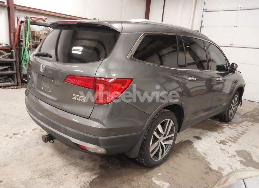 Photo 4 of 2016 Honda Pilot TOURING (VIN 5FNYF6H93GB124976)