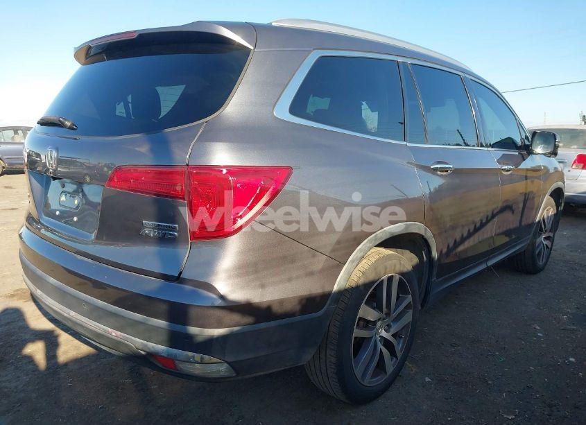 Photo 4 of 2016 Honda Pilot TOURING (VIN 5FNYF6H94GB054744)