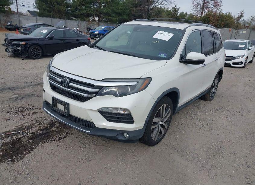 Photo 2 of 2017 Honda Pilot TOURING (VIN 5FNYF6H94HB022281)