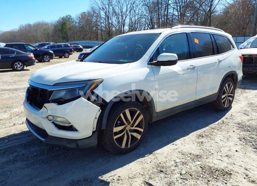 Photo 2 of 2016 Honda Pilot TOURING (VIN 5FNYF6H95GB030274)