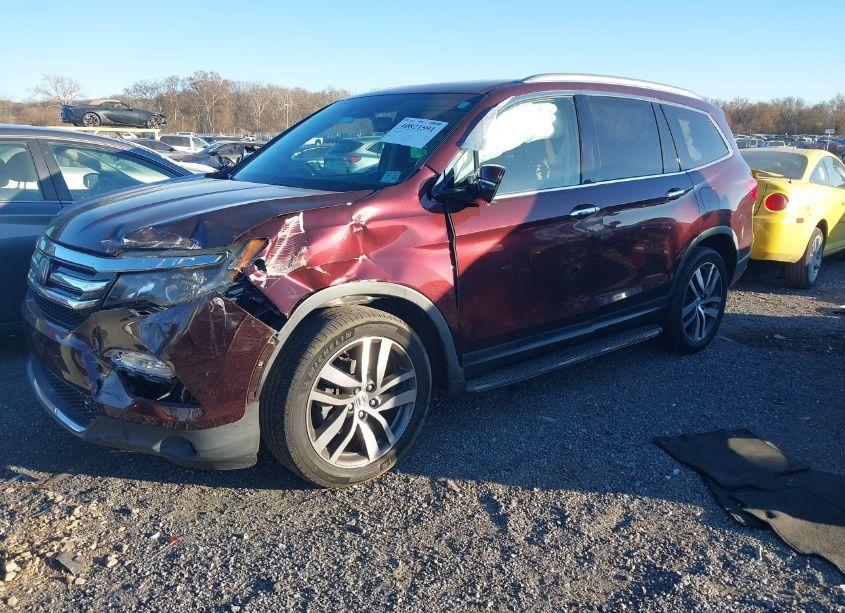 Photo 2 of 2016 Honda Pilot TOURING (VIN 5FNYF6H95GB096551)