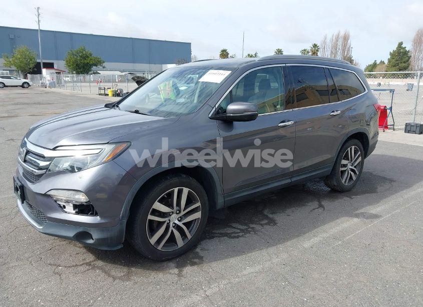 Photo 2 of 2016 Honda Pilot TOURING (VIN 5FNYF6H95GB107886)