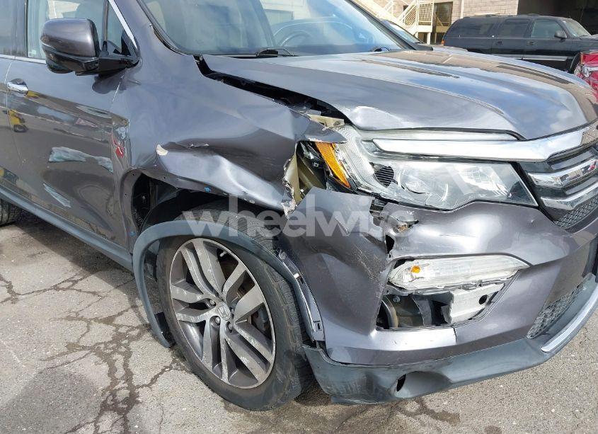 Photo 6 of 2016 Honda Pilot TOURING (VIN 5FNYF6H95GB107886)