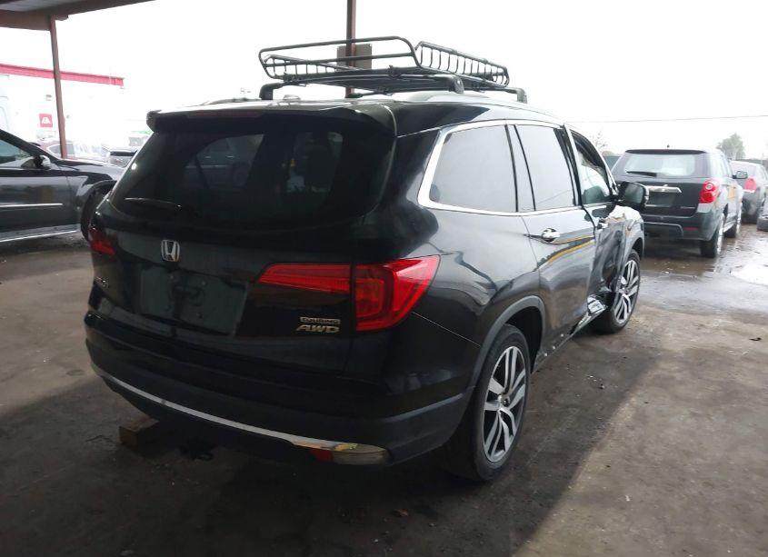 Photo 4 of 2017 Honda Pilot TOURING (VIN 5FNYF6H96HB017678)