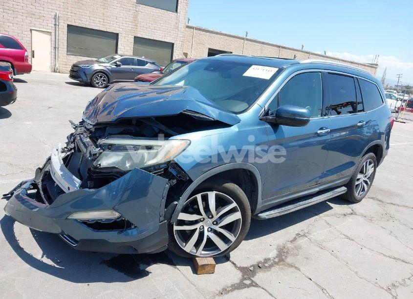 Photo 2 of 2016 Honda Pilot TOURING (VIN 5FNYF6H97GB054043)