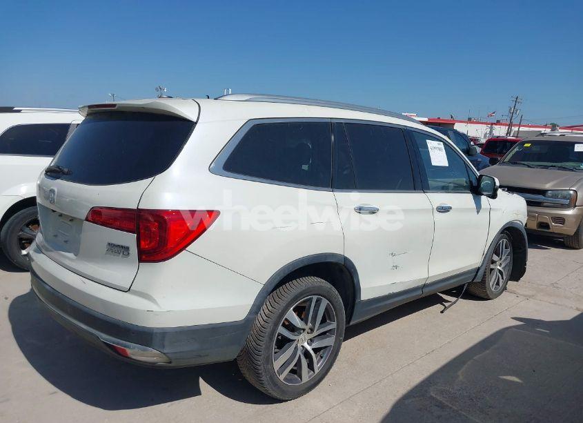 Photo 4 of 2016 Honda Pilot TOURING (VIN 5FNYF6H97GB088824)