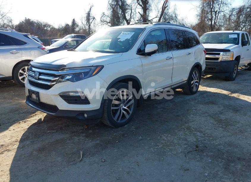 Photo 2 of 2017 Honda Pilot TOURING (VIN 5FNYF6H97HB021402)