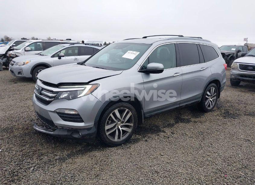 Photo 2 of 2016 Honda Pilot TOURING (VIN 5FNYF6H9XGB104806)