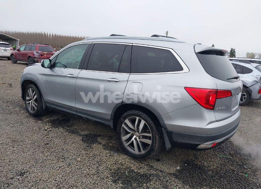 Photo 3 of 2016 Honda Pilot TOURING (VIN 5FNYF6H9XGB104806)
