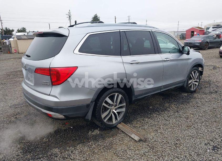 Photo 4 of 2016 Honda Pilot TOURING (VIN 5FNYF6H9XGB104806)