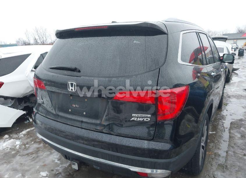 Photo 4 of 2017 Honda Pilot TOURING (VIN 5FNYF6H9XHB051705)