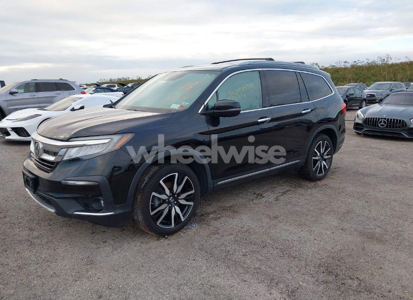 Photo 2 of 2019 Honda Pilot TOURING (VIN 5FNYF6H9XKB013169)