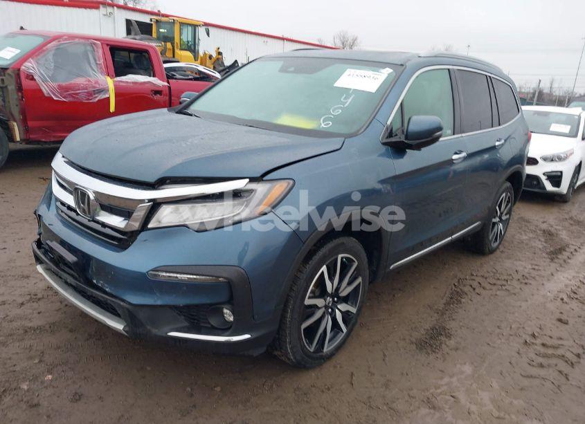 Photo 2 of 2019 Honda Pilot TOURING (VIN 5FNYF6H9XKB091466)
