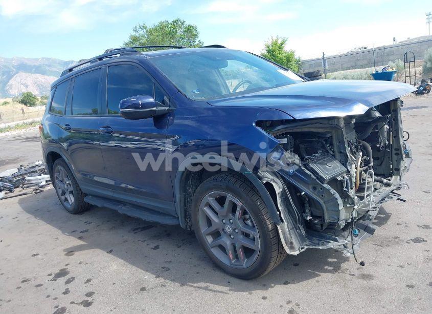2023 Honda Passport AWD EX-L (VIN 5FNYF8H50PB007445) main photo
