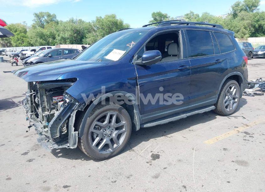 Photo 2 of 2023 Honda Passport AWD EX-L (VIN 5FNYF8H50PB007445)